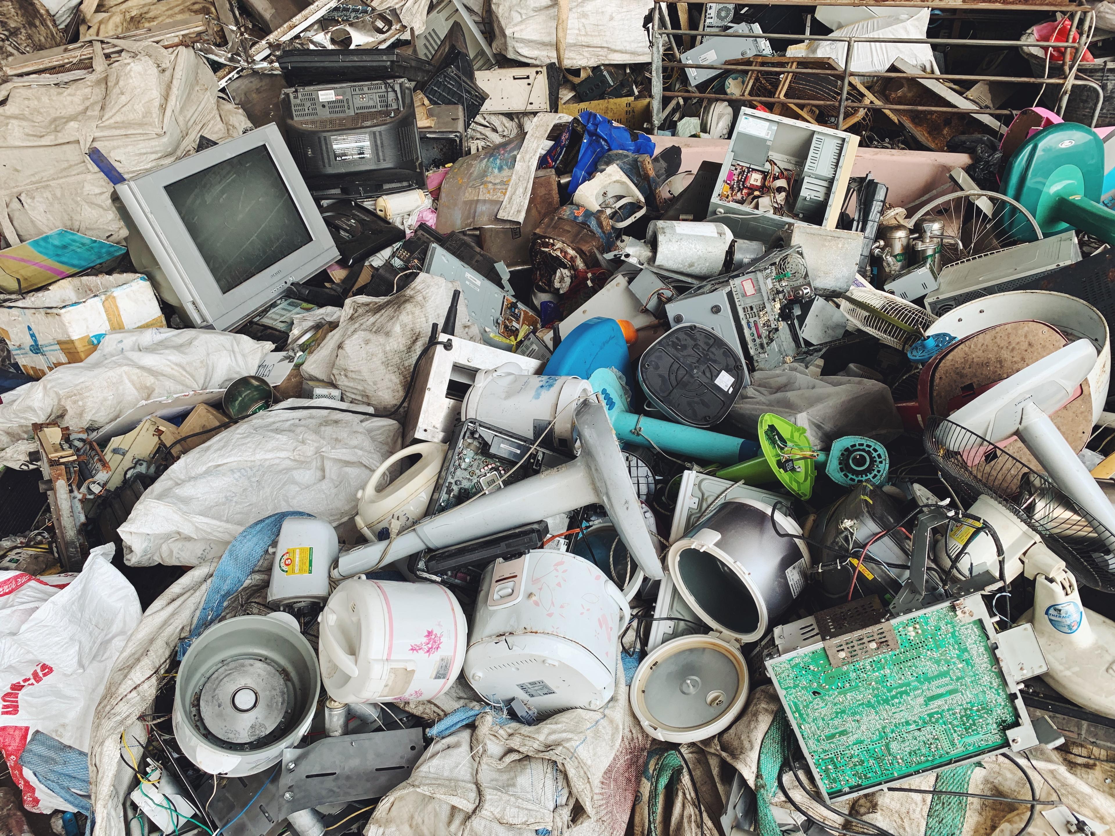 Bulky household items and debris gathered for a major cleanout.